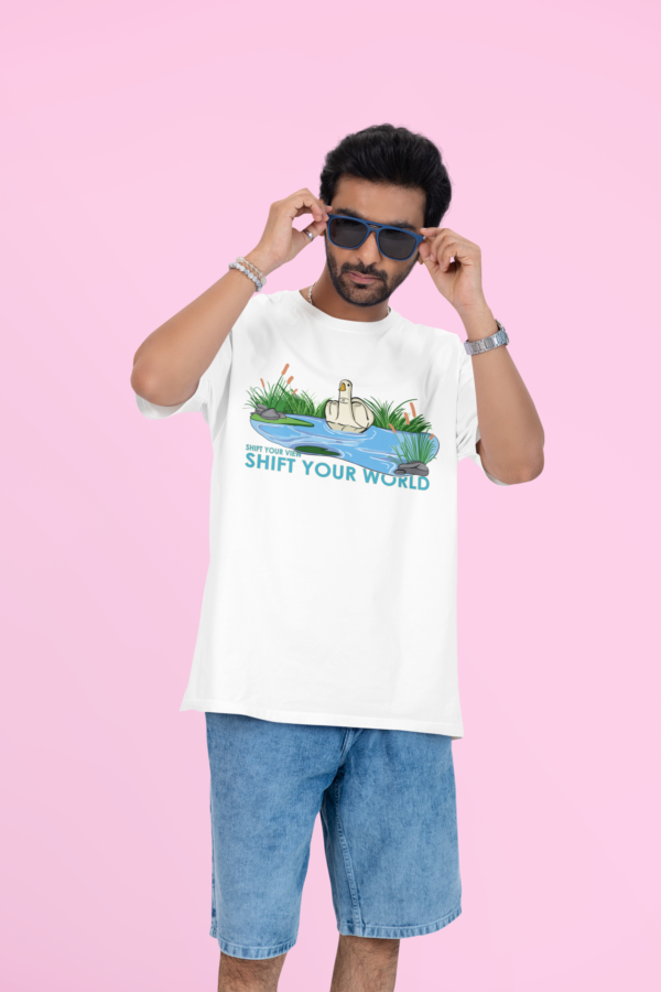 oversized t shirt mockup featuring a man putting on his sunglasses in a studio m53043 (1)