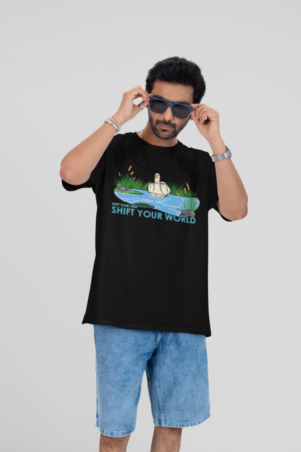 oversized t shirt mockup featuring a man putting on his sunglasses in a studio m53043 (2)