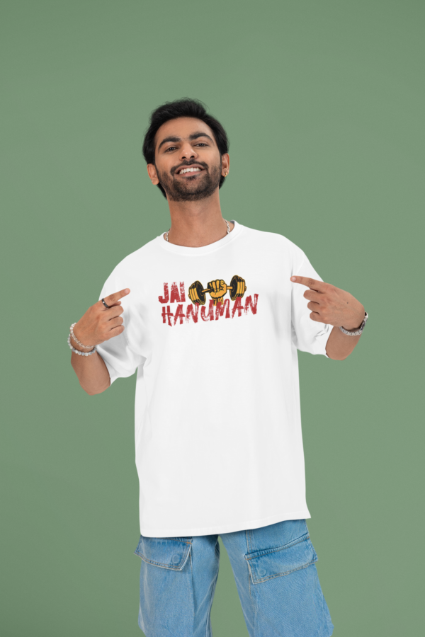 mockup of a cheerful man pointing at his oversized round neck t shirt in a studio m53040 (5)
