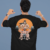 back view mockup featuring a man pointing at his oversized t shirt m53038 (10)
